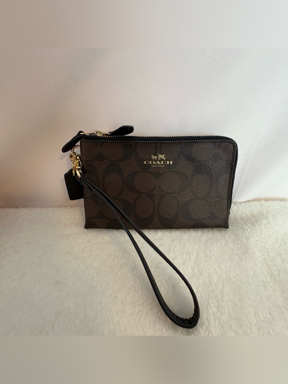 Coach Brown and Black Signature Wristlet with Gold Hardware and 2 compartments